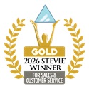 Gold Stevie Award winner emblem for 2026 in sales and customer service, featuring a golden figure holding a blue triangle and surrounded by a gold laurel wreath.